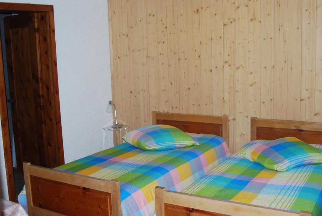 Postel nebo postele na pokoji v ubytování Hotel Restaurant Monte Leone
