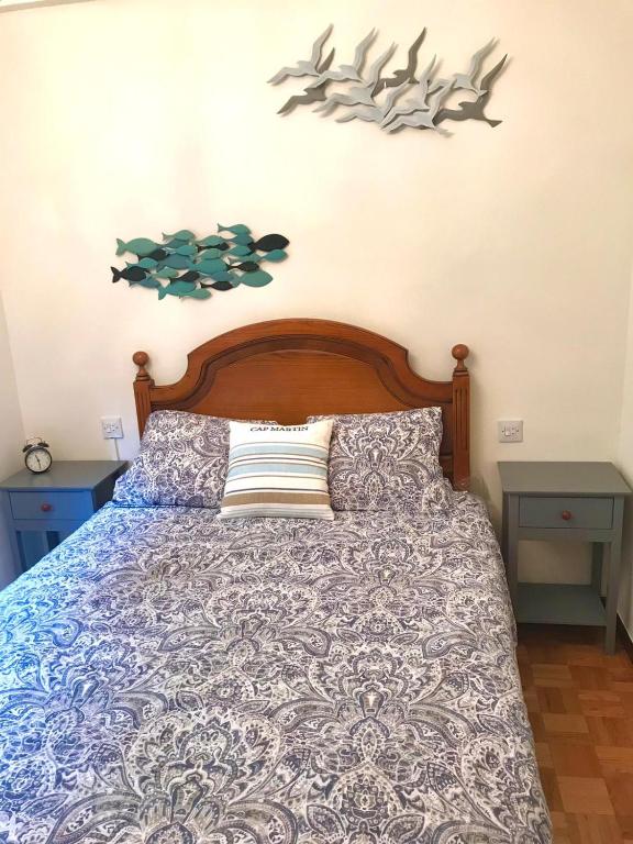Postel nebo postele na pokoji v ubytování La Casina de Colores de Cudillero