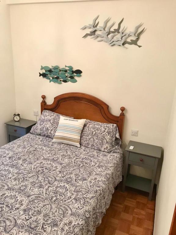 Postel nebo postele na pokoji v ubytování La Casina de Colores de Cudillero