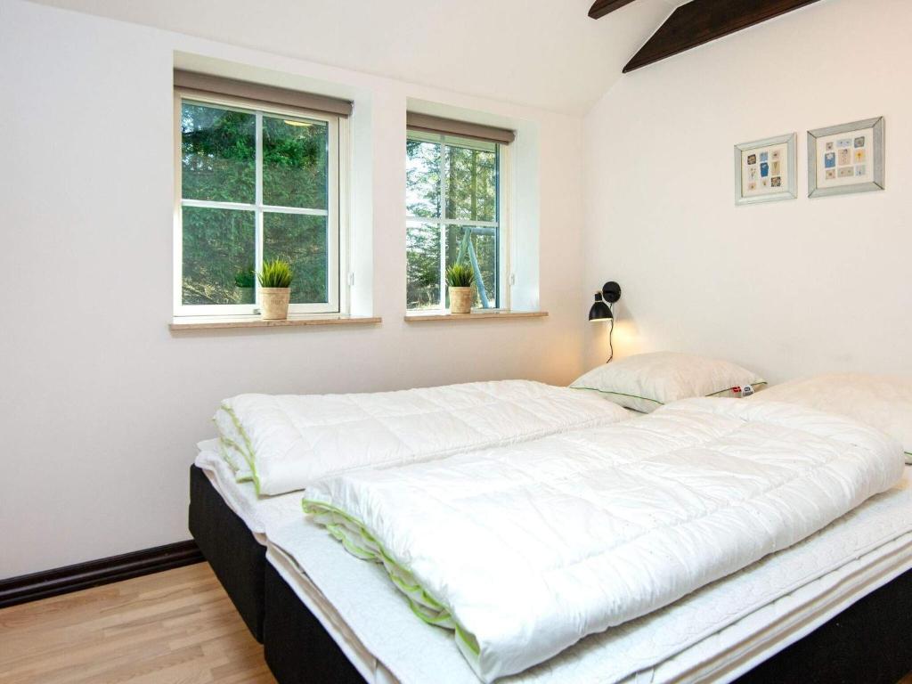 Postel nebo postele na pokoji v ubytování Holiday home Toftlund XLII