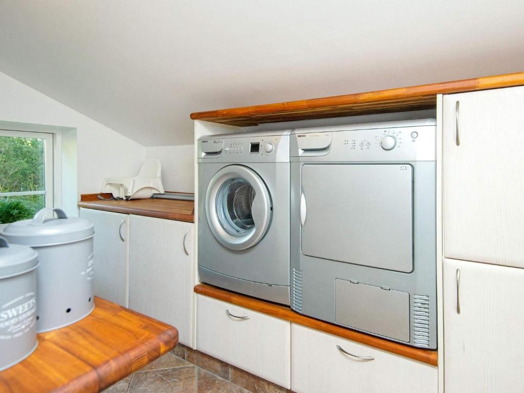 Kuchyň nebo kuchyňský kout v ubytování Holiday home Toftlund XLII