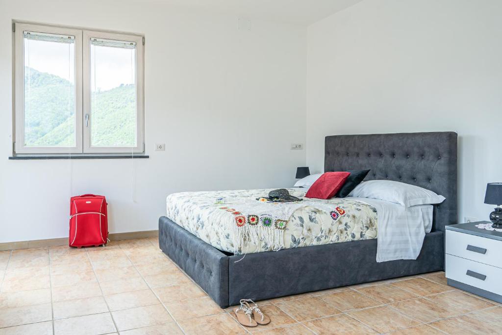 Postel nebo postele na pokoji v ubytování Il Casale di Don Matteo