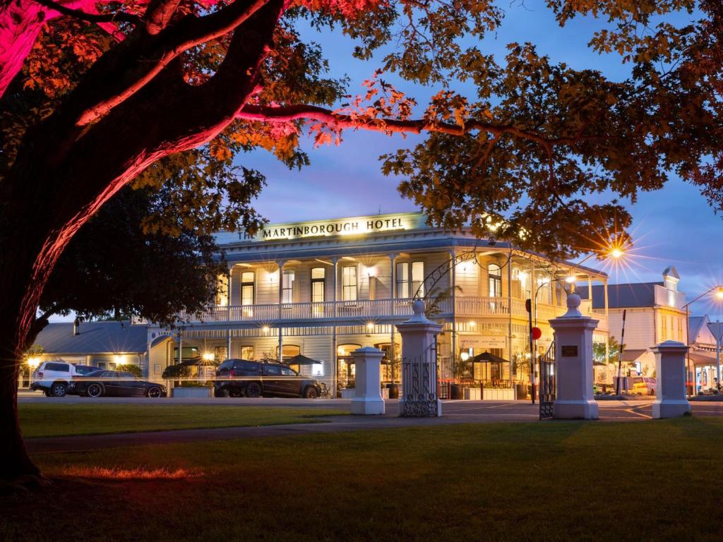 a building with a car parked in front of it at The Martinborough Hotel in Martinborough