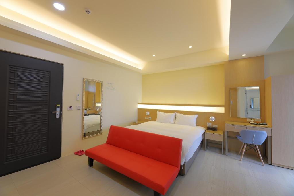 Postel nebo postele na pokoji v ubytování Donghao Hotel