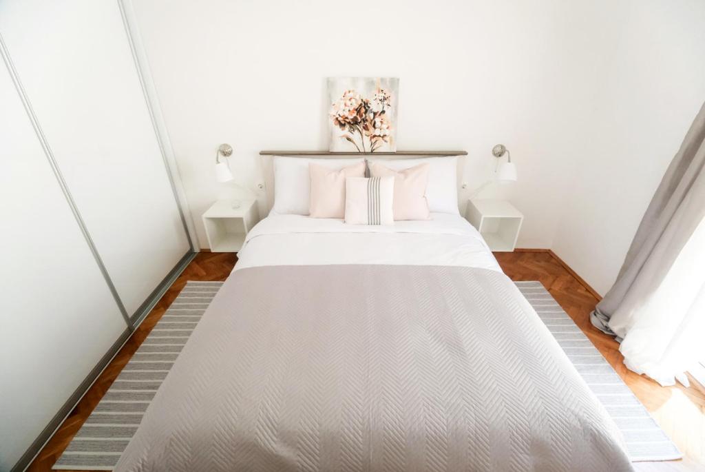 Posteľ alebo postele v izbe v ubytovaní LUXURY APARTMENT MEJE