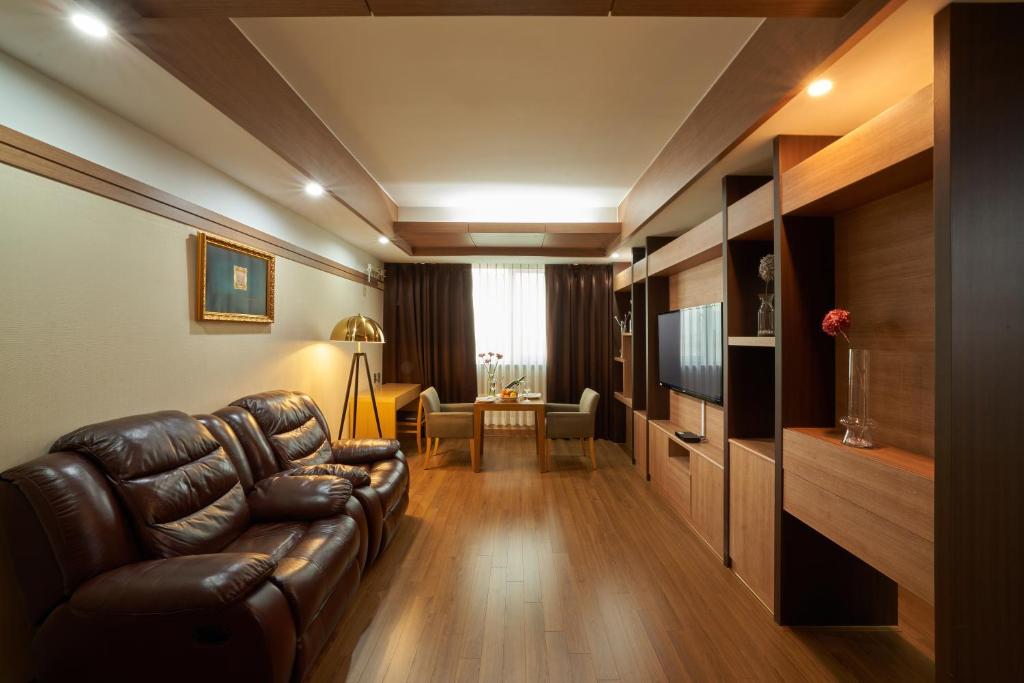 TV a/nebo společenská místnost v ubytování Gyeongju GG Tourist Hotel