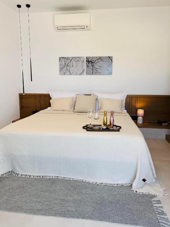 Posteľ alebo postele v izbe v ubytovaní Portobello Boutique Hotel