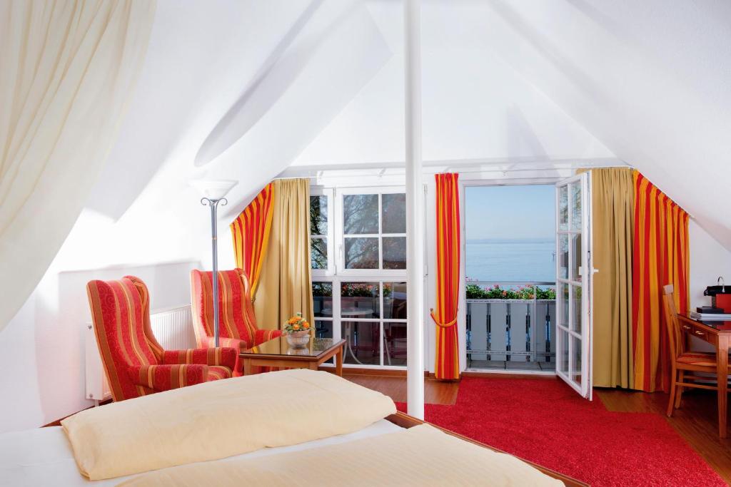 Postel nebo postele na pokoji v ubytování Hotel Seeperle