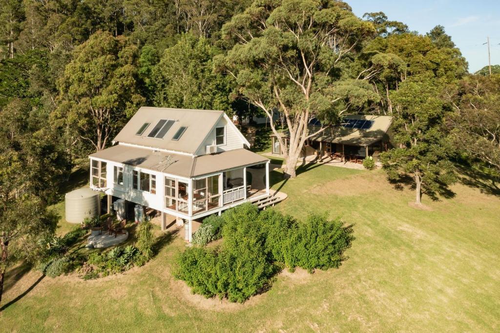 an aerial view of a house in the trees at Yarrawong Farm, near Berry in Jaspers Brush
