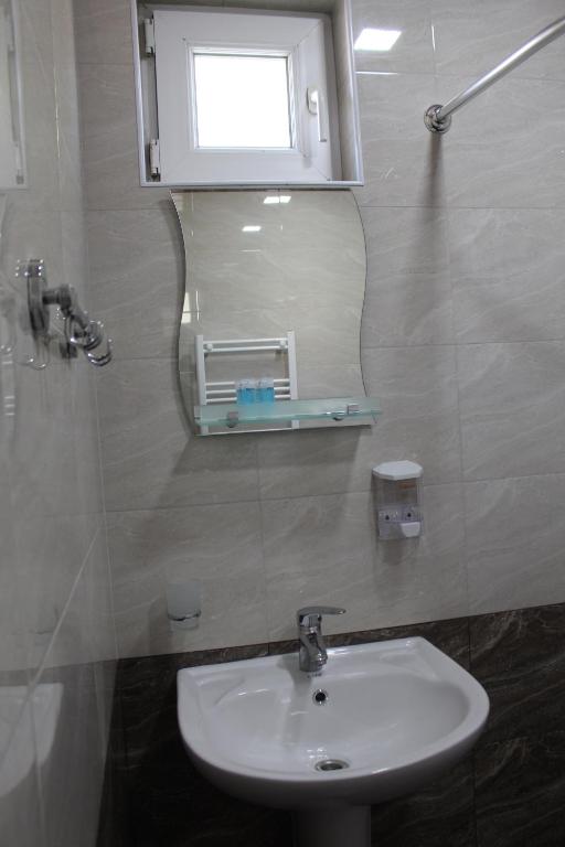 Koupelna v ubytování Hotel Rabati