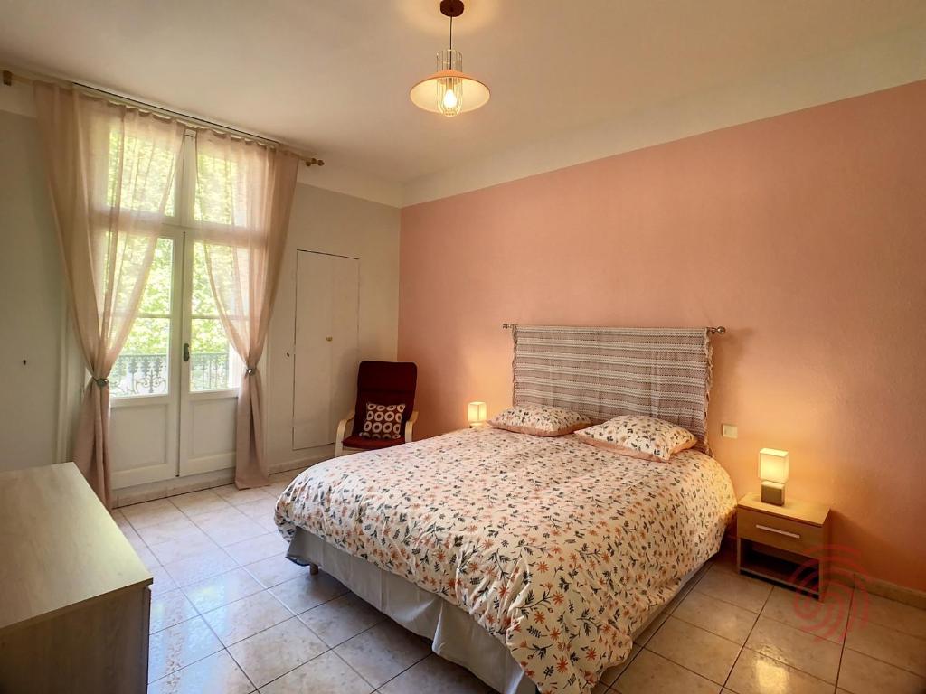 Posteľ alebo postele v izbe v ubytovaní Appartement Lamalou-les-Bains, 2 pièces, 2 personnes - FR-1-451-162