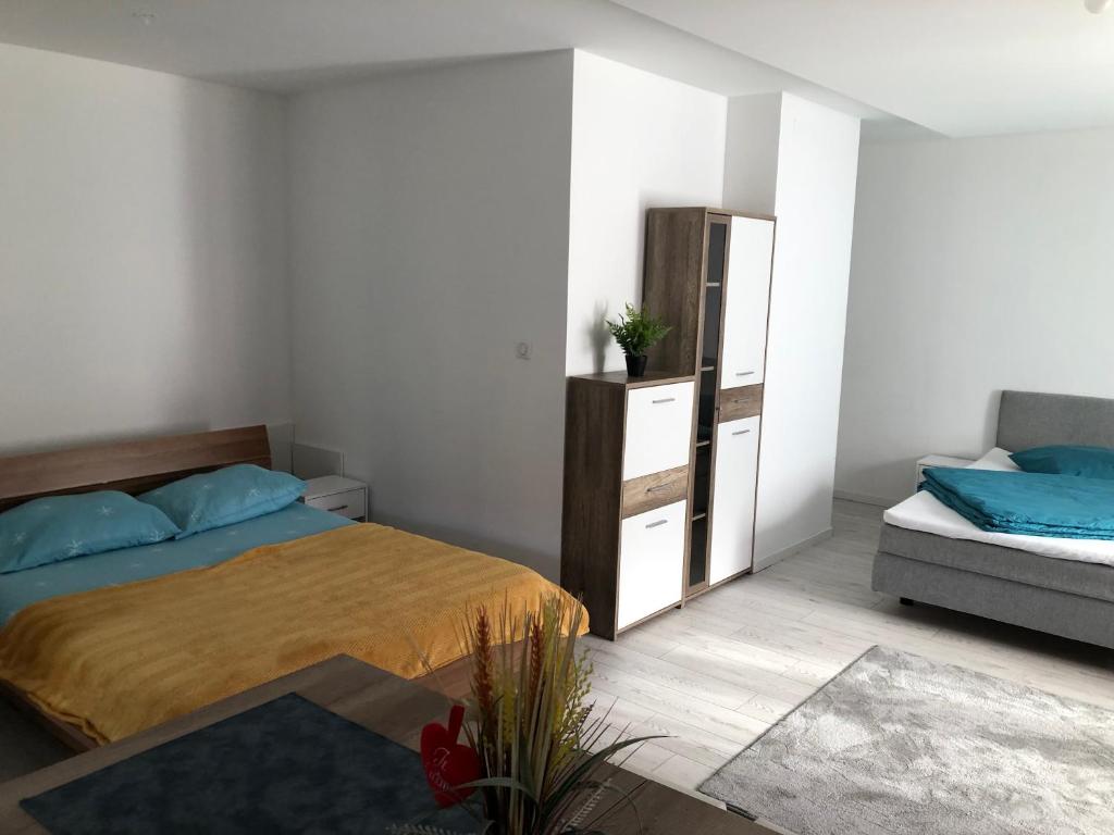 Postel nebo postele na pokoji v ubytování Appartement Willa chez willi