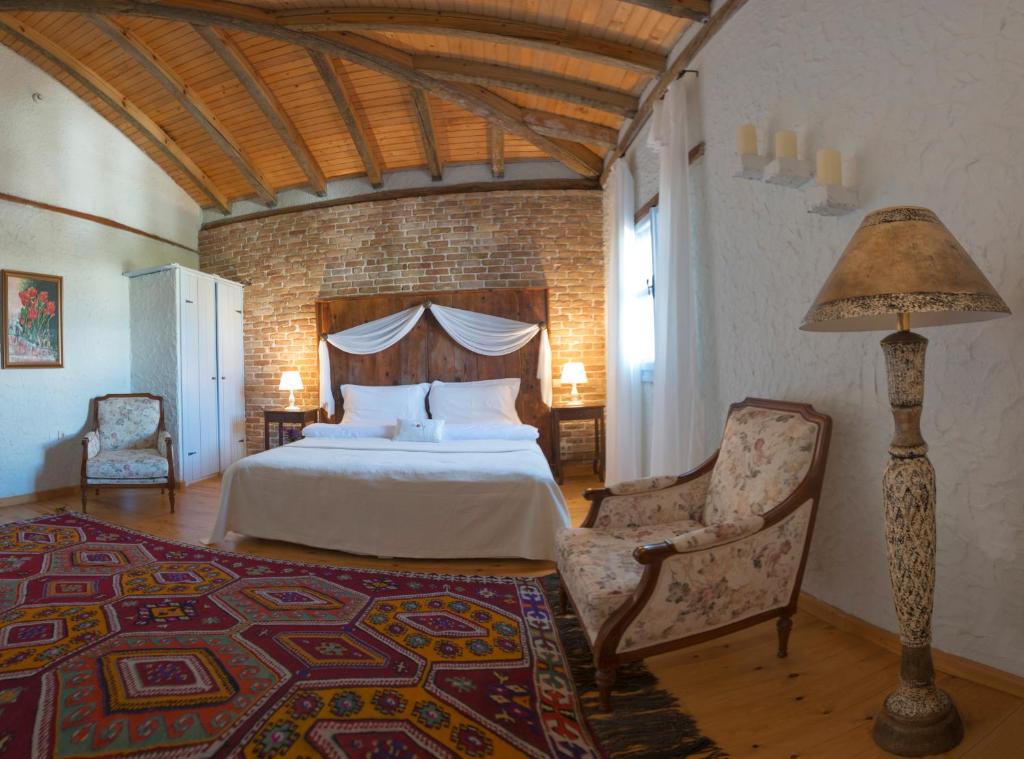 Postel nebo postele na pokoji v ubytování Moy Hotel