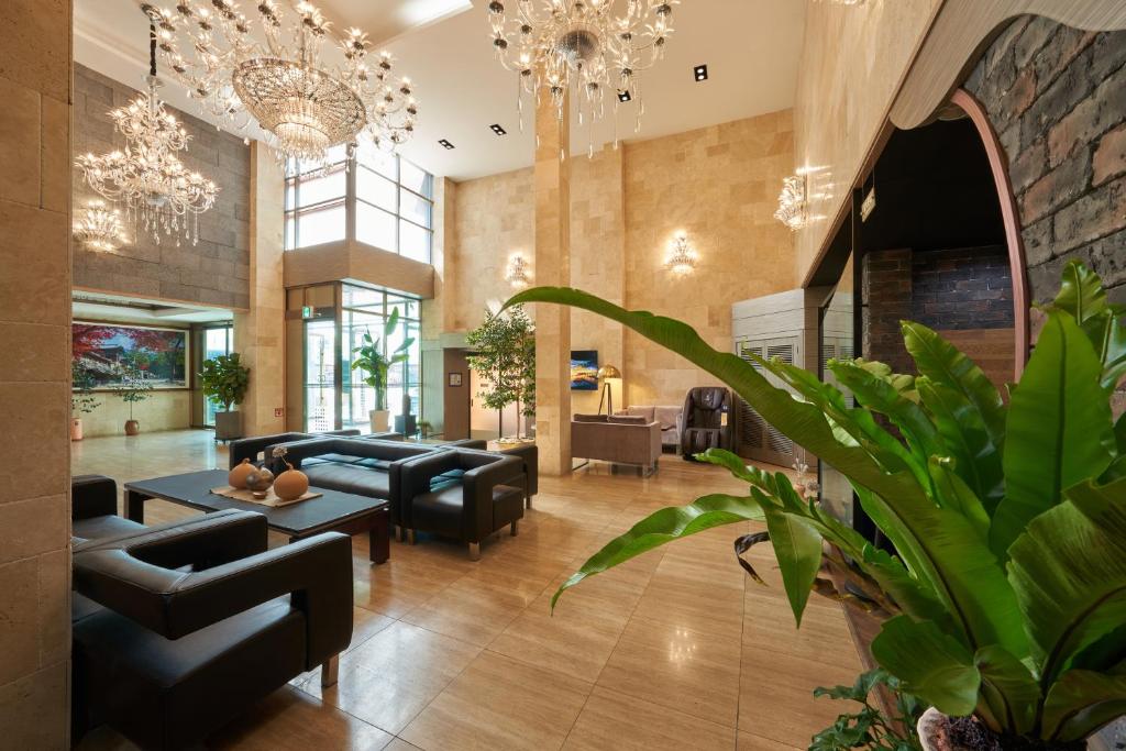 TV a/nebo společenská místnost v ubytování Gyeongju GG Tourist Hotel