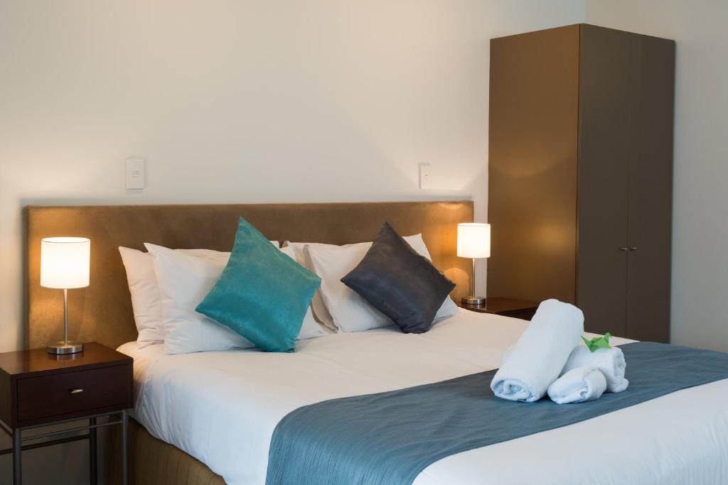 Postel nebo postele na pokoji v ubytování Tresori Motor Lodge
