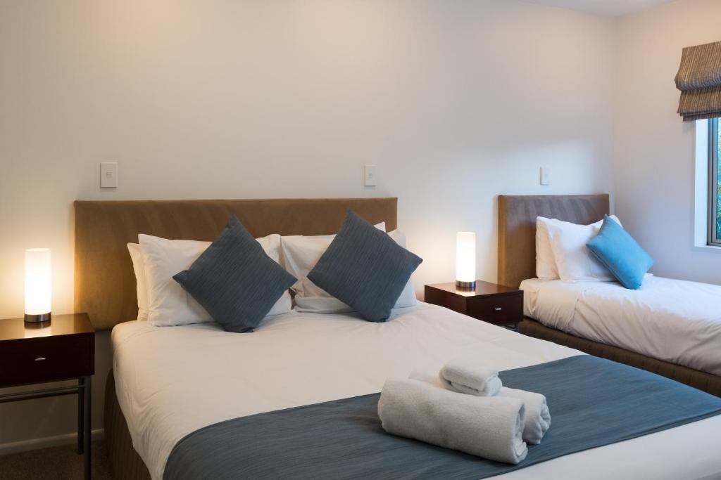 Postel nebo postele na pokoji v ubytování Tresori Motor Lodge