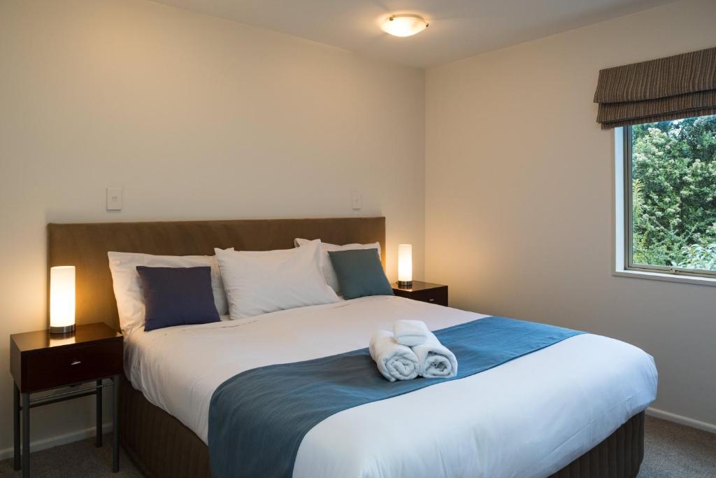 Postel nebo postele na pokoji v ubytování Tresori Motor Lodge