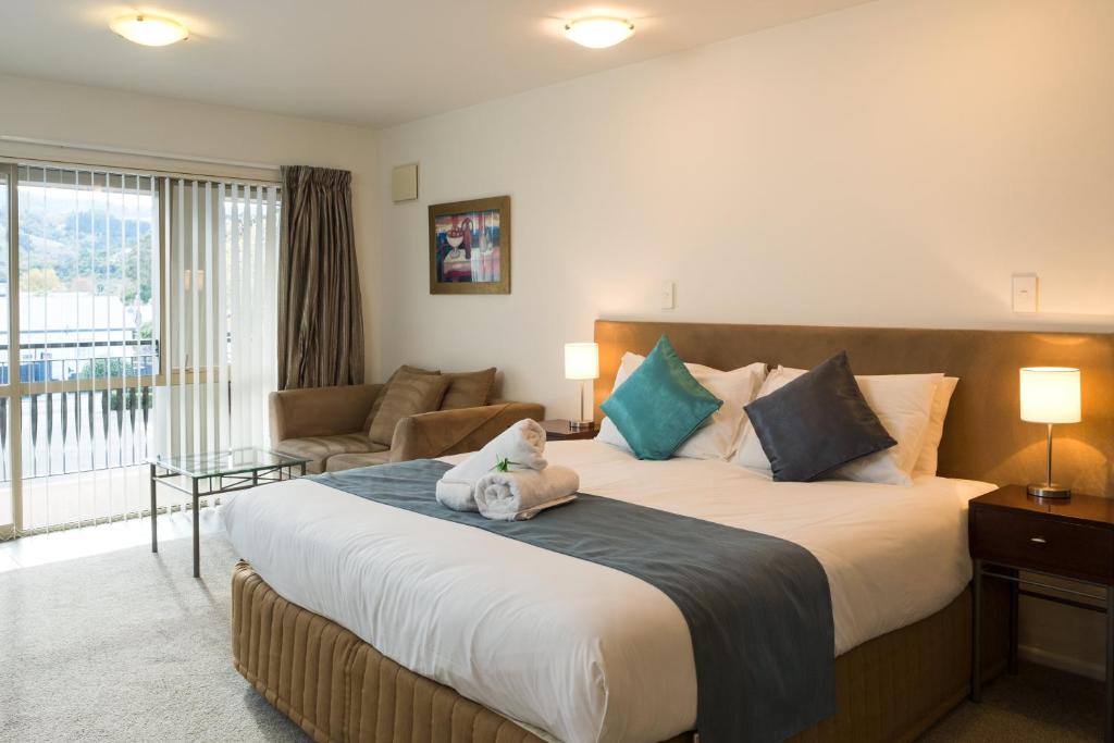 Postel nebo postele na pokoji v ubytování Tresori Motor Lodge