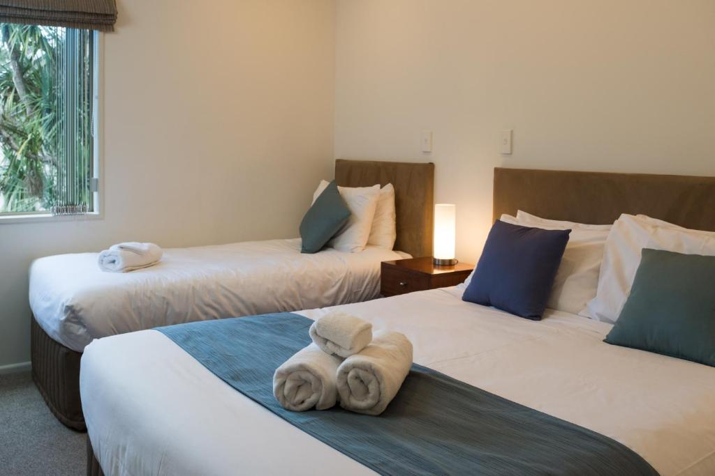 Postel nebo postele na pokoji v ubytování Tresori Motor Lodge