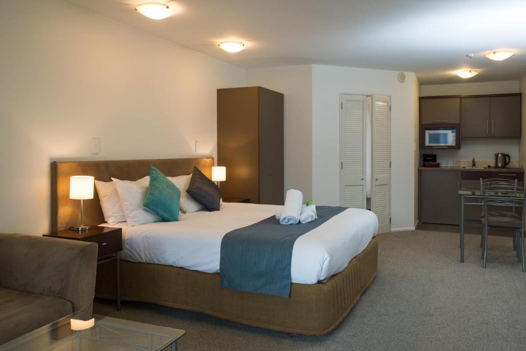 Postel nebo postele na pokoji v ubytování Tresori Motor Lodge