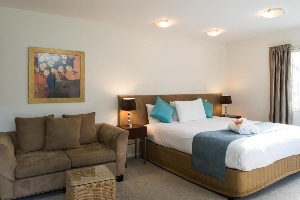 Postel nebo postele na pokoji v ubytování Tresori Motor Lodge