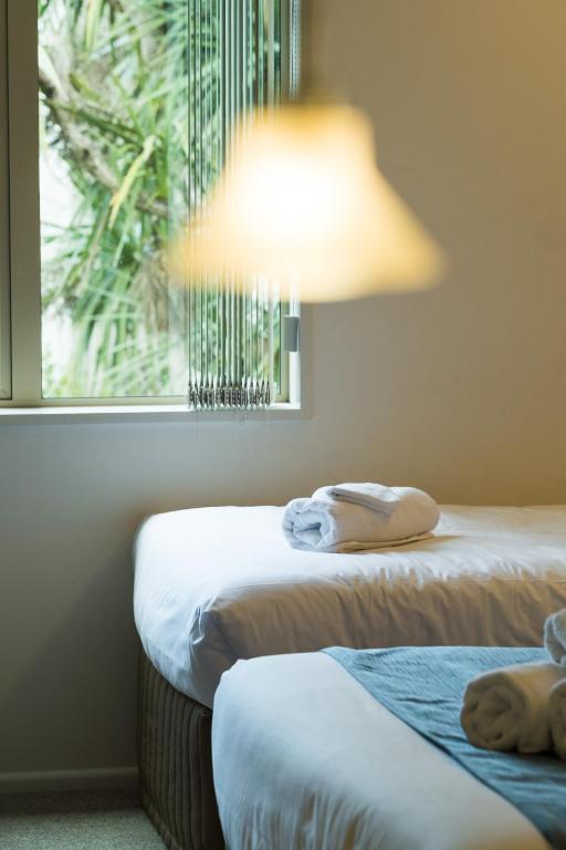 Postel nebo postele na pokoji v ubytování Tresori Motor Lodge