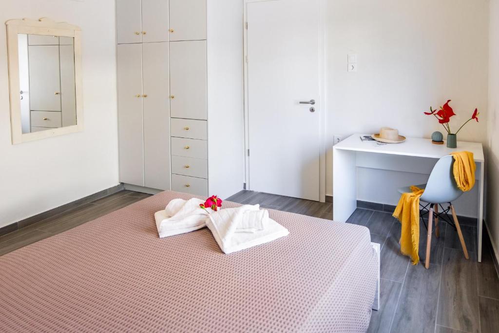 Postel nebo postele na pokoji v ubytování Casa In Centro Chania
