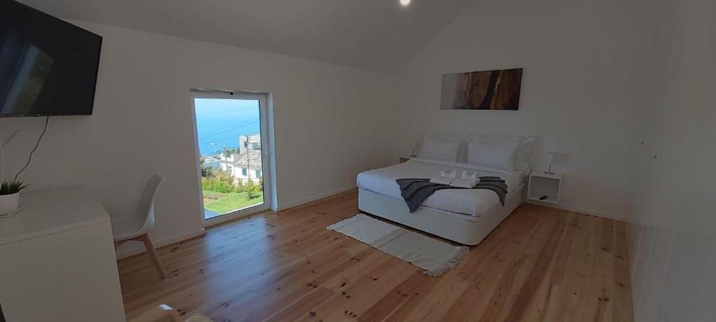 TV a/nebo společenská místnost v ubytování House Nobrega of Madeira