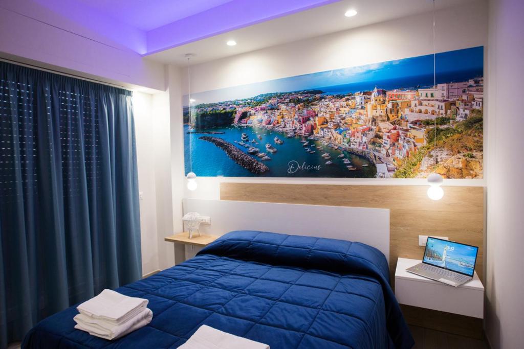 Letto o letti in una camera di B&B DELICIUS