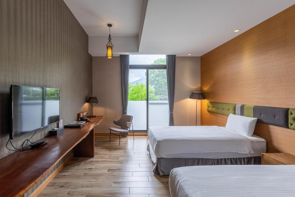 Postel nebo postele na pokoji v ubytování Hualien Toongmao Resort