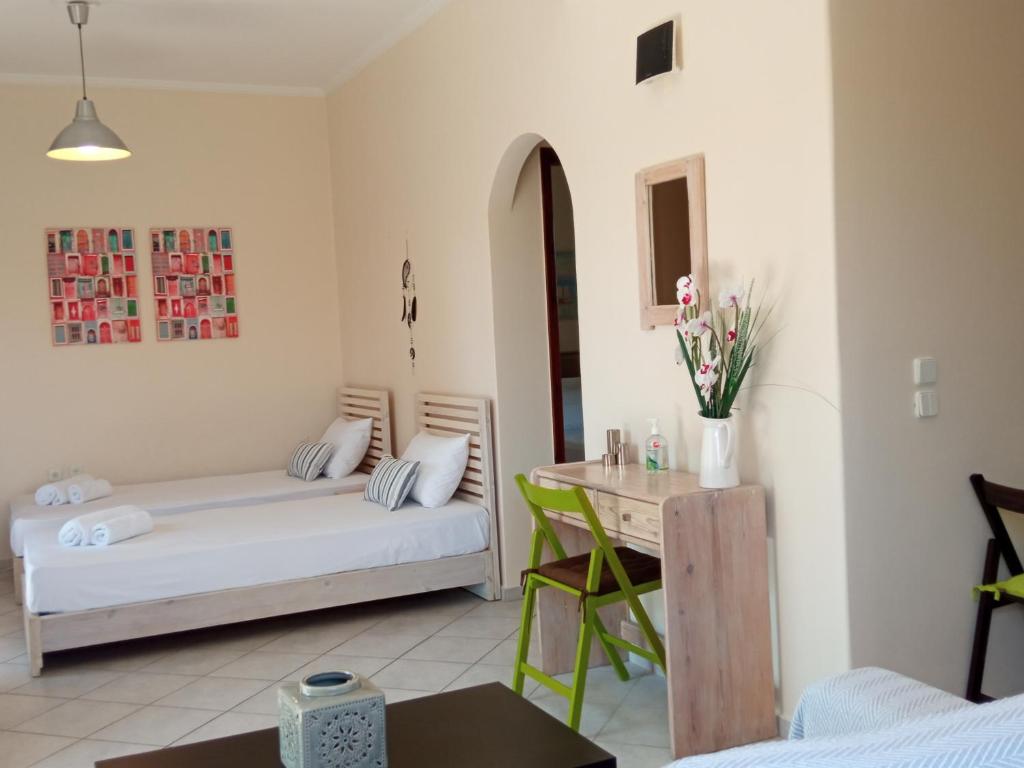 Posteľ alebo postele v izbe v ubytovaní Sea Side House Kourouta