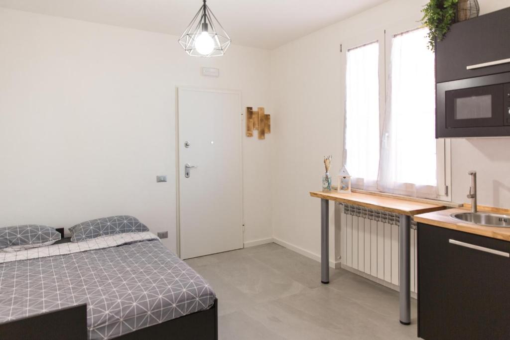 Postel nebo postele na pokoji v ubytování Bed&Biker
