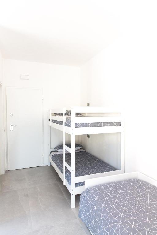 Postel nebo postele na pokoji v ubytování Bed&Biker
