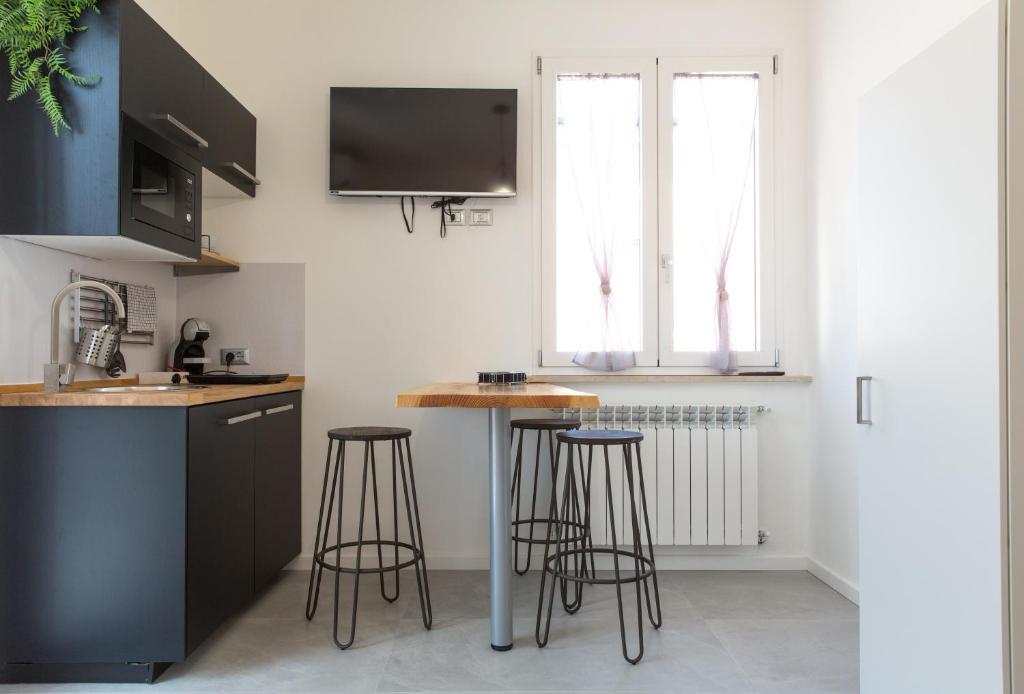 Kuchyň nebo kuchyňský kout v ubytování Bed&Biker