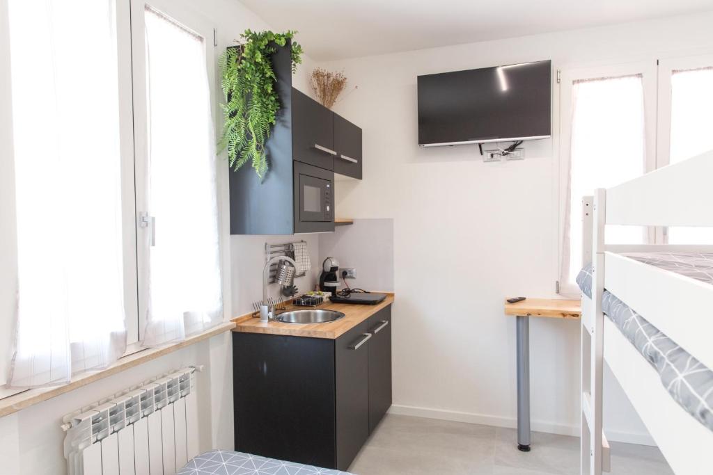 Kuchyň nebo kuchyňský kout v ubytování Bed&Biker