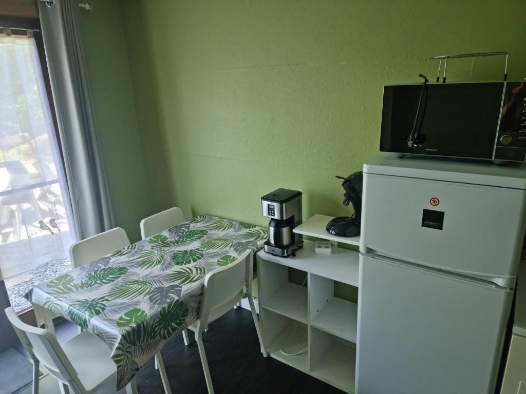 Kuchyň nebo kuchyňský kout v ubytování Vitam-Inn