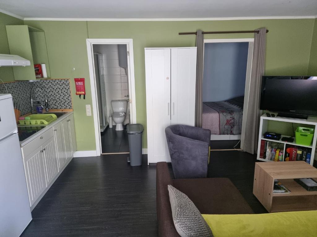 Kuchyň nebo kuchyňský kout v ubytování Vitam-Inn