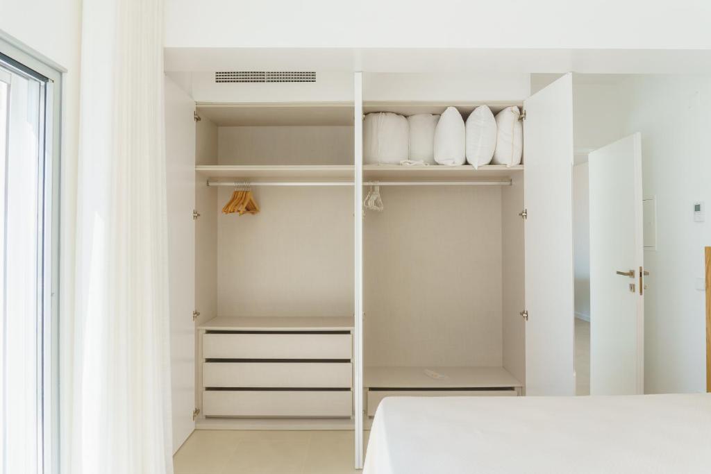 Cama ou camas em um quarto em Marisol Mar