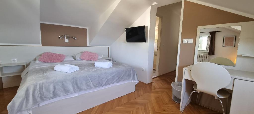 Posteľ alebo postele v izbe v ubytovaní Apartment Residence Narona