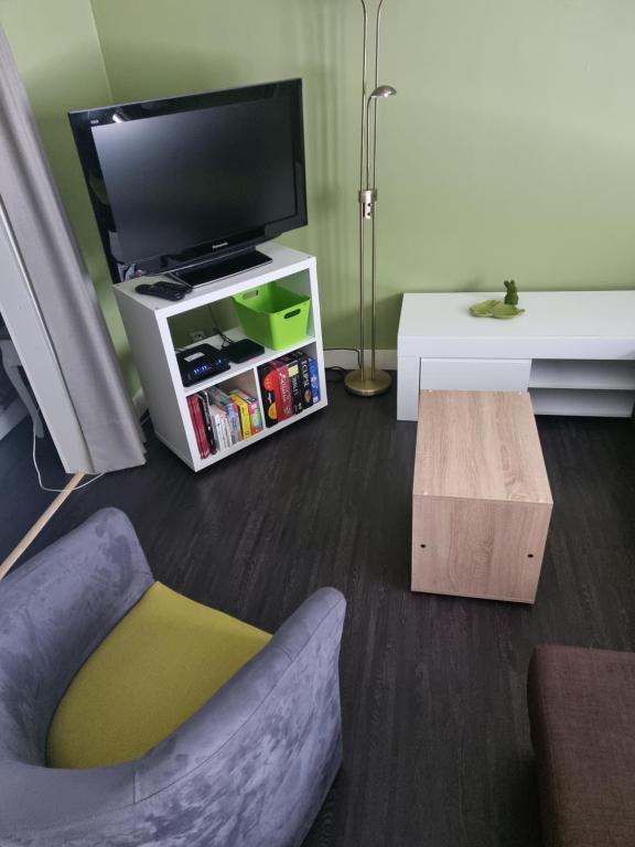 TV a/nebo společenská místnost v ubytování Vitam-Inn