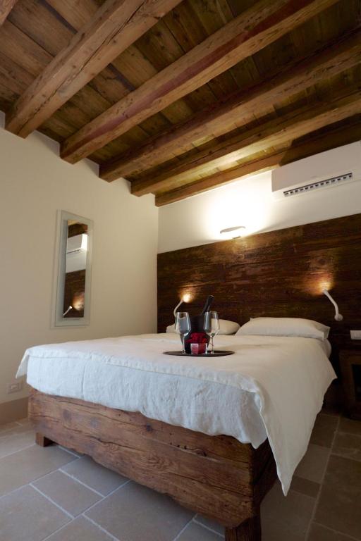 Postel nebo postele na pokoji v ubytování Hotel Antica Abbazia