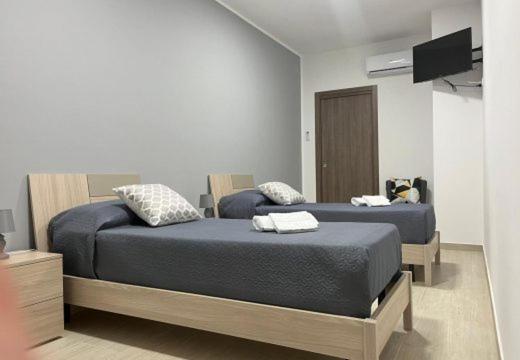 Posteľ alebo postele v izbe v ubytovaní B&B Alessia