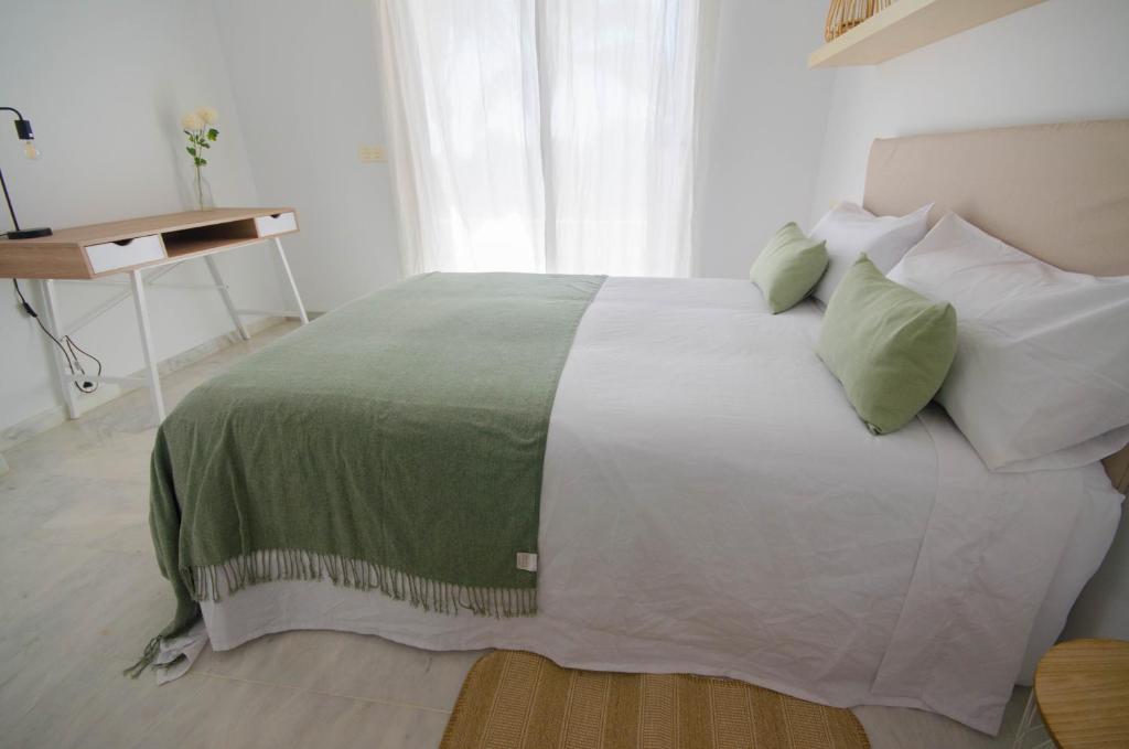 Postel nebo postele na pokoji v ubytování Apartamento Valle Romano