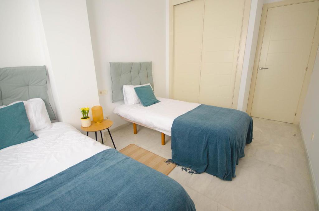 Postel nebo postele na pokoji v ubytování Apartamento Valle Romano