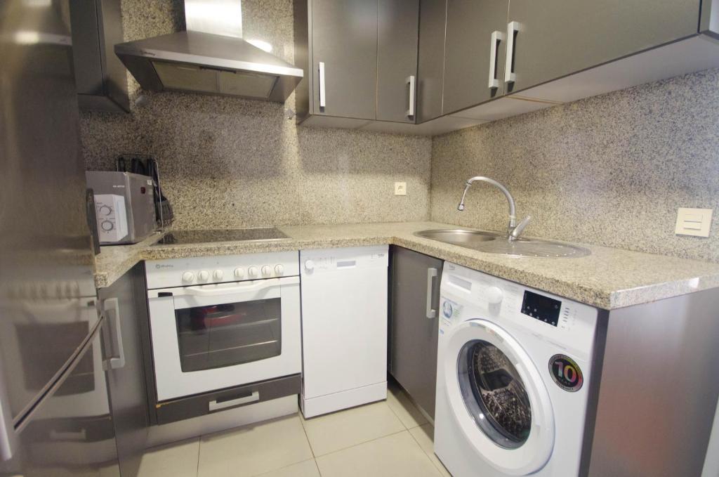 Kuchyň nebo kuchyňský kout v ubytování Apartamento Valle Romano