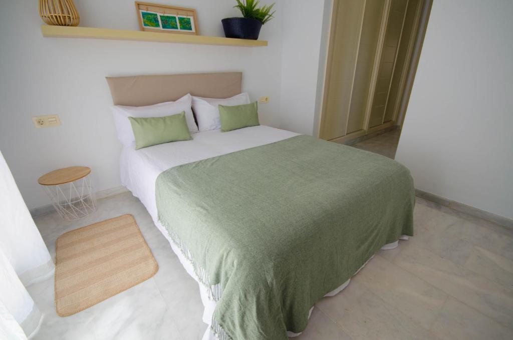 Postel nebo postele na pokoji v ubytování Apartamento Valle Romano