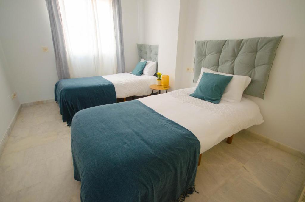 Postel nebo postele na pokoji v ubytování Apartamento Valle Romano