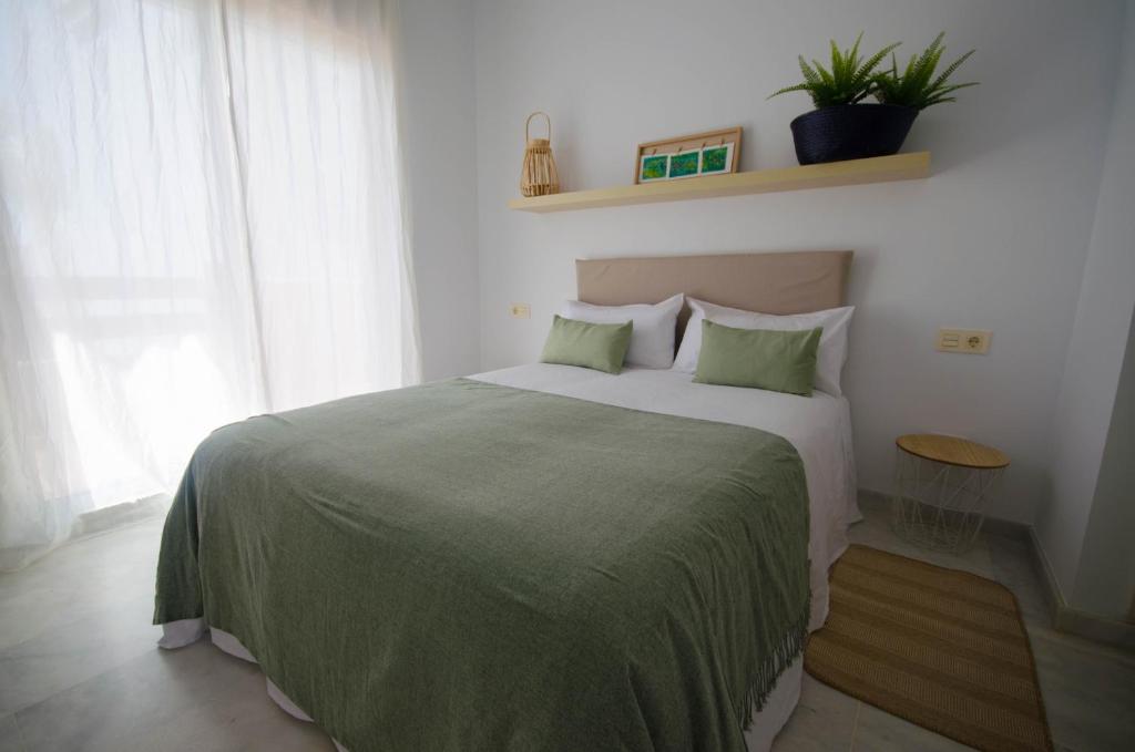 Postel nebo postele na pokoji v ubytování Apartamento Valle Romano
