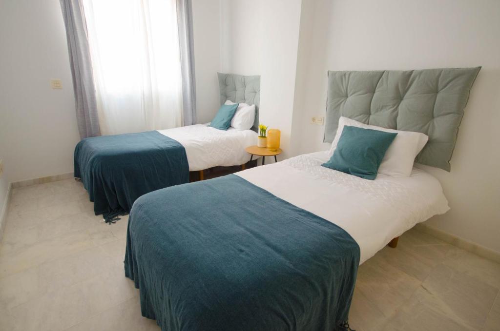 Postel nebo postele na pokoji v ubytování Apartamento Valle Romano