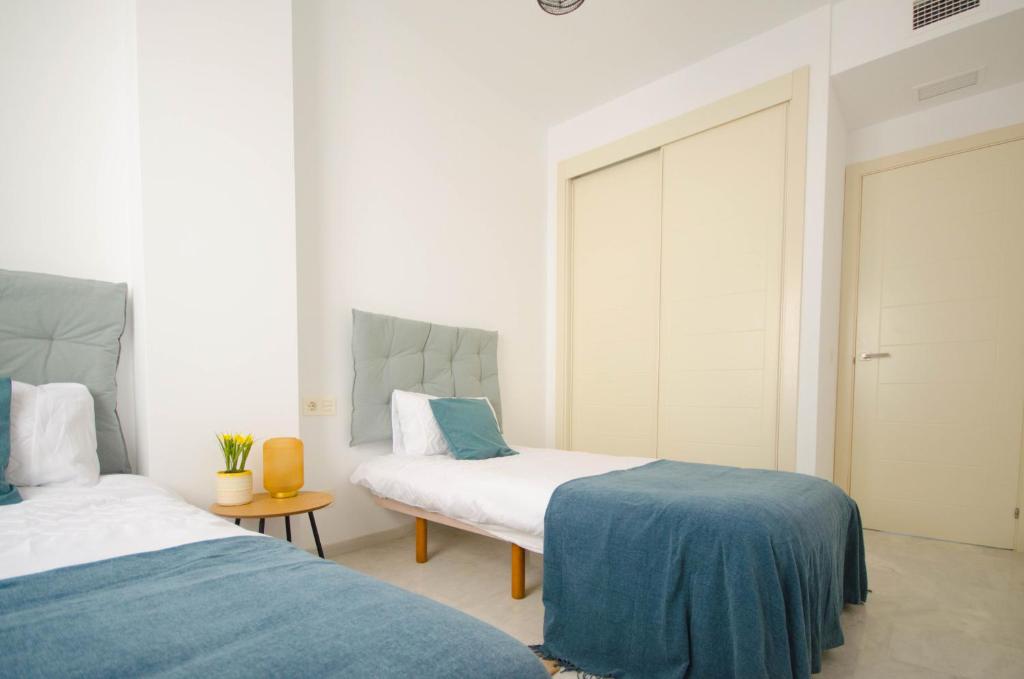 Postel nebo postele na pokoji v ubytování Apartamento Valle Romano